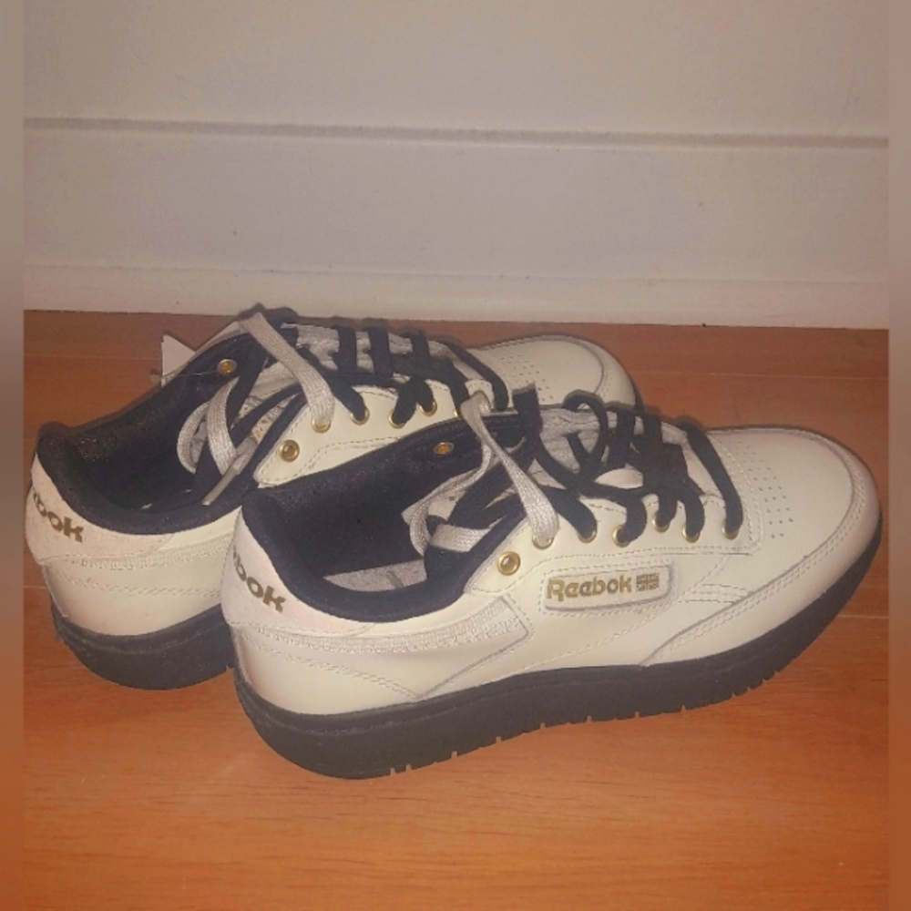 Reebok white shoes size 7 new with tag. Reebok platform shoes